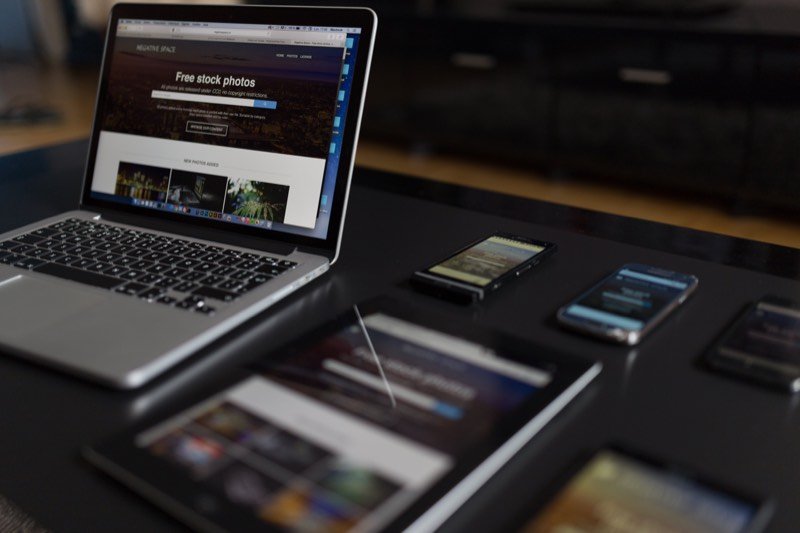 The same website shown on a laptop, a tablet and two phones